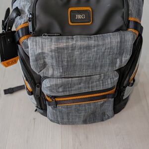 TUMI Charcoal and Black Backpack with Orange Accents
